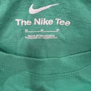 Nike Tee color green. Unisex shirt, size Medium.